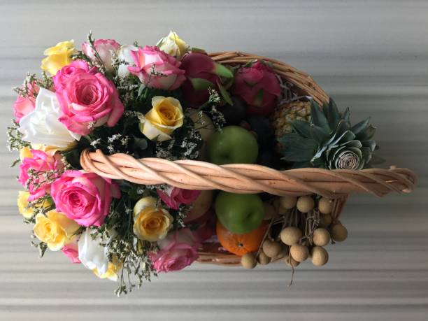 istock Fruit basket with colorful flower 845423936