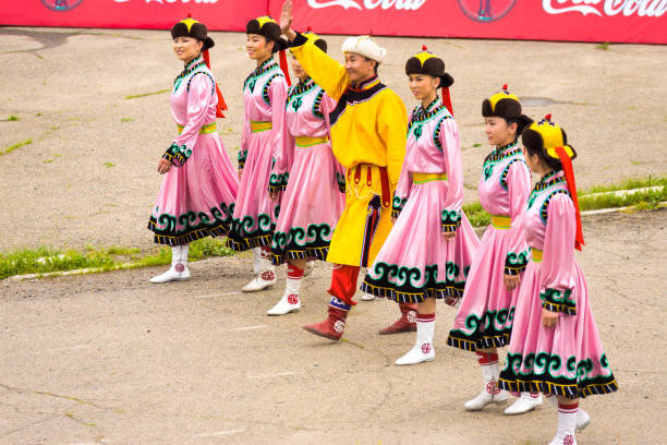 naadam festival opening ceremony frauen rosa kleid - inner mongolia stock-fotos und bilder