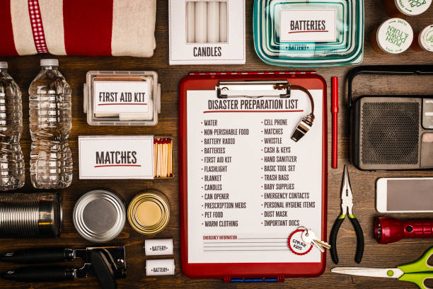 Disaster preparation kit flat lay. Items needed for disaster preparedness Disaster preparation kit flat lay. Items needed for disaster preparedness preparation stock pictures, royalty-free photos & images