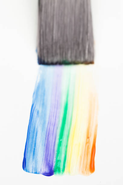 istock Paintbrush with a rainbow brush stroke 845461214
