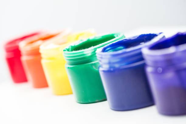 istock Rainbow paint pots in a line for gay pride 845461250