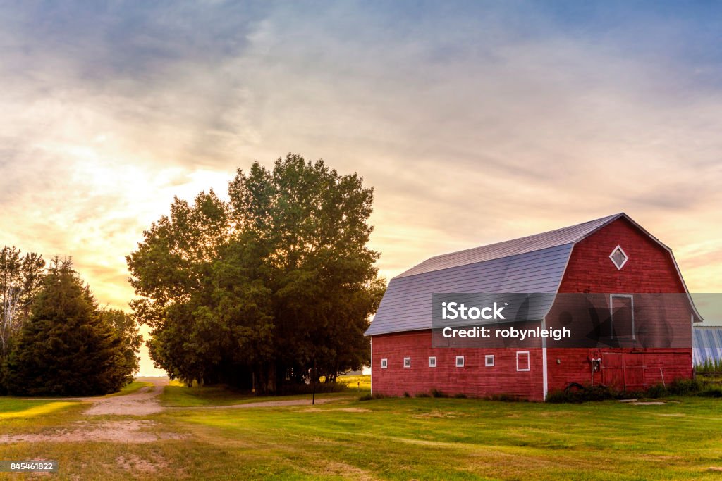 Red Barn at Sunset Barn Stock Photo