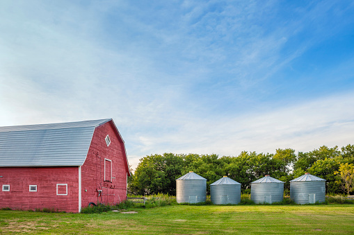 Red Barn and Row of Silos