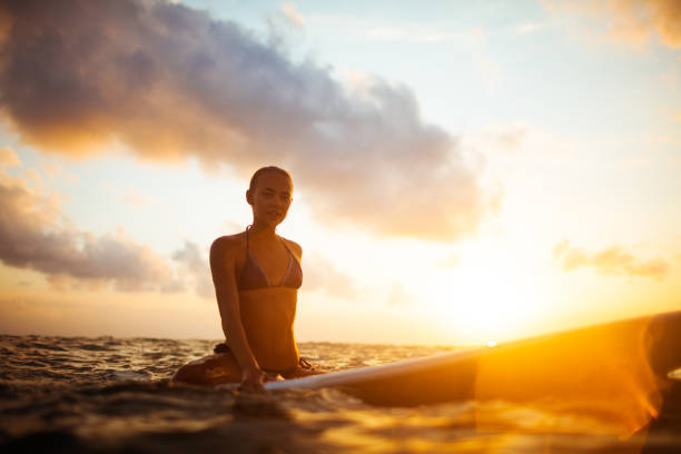 istock young surfer woman 845464540