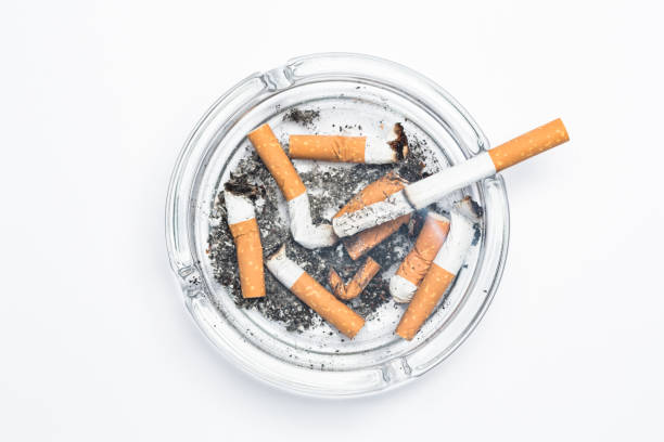 istock Overhead of burning cigarette in ashtray 845467776