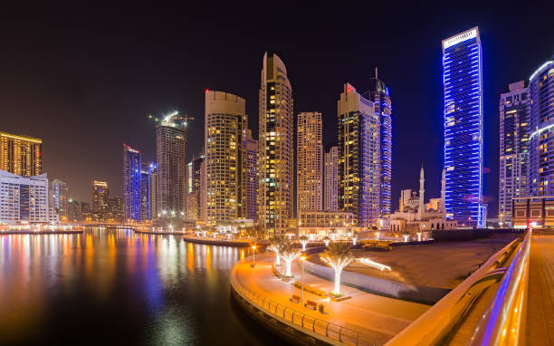 istock Dubai Marina night mosque skyline cityscape, UAE. 845468226