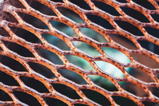 istock Old rusty fence mesh fence 845471072