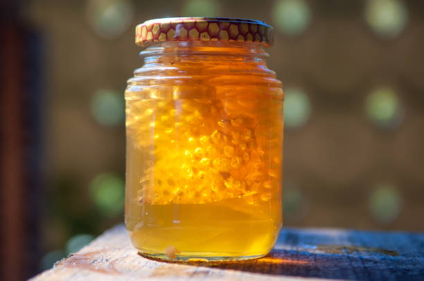 istock Honey in glass pot 845479582