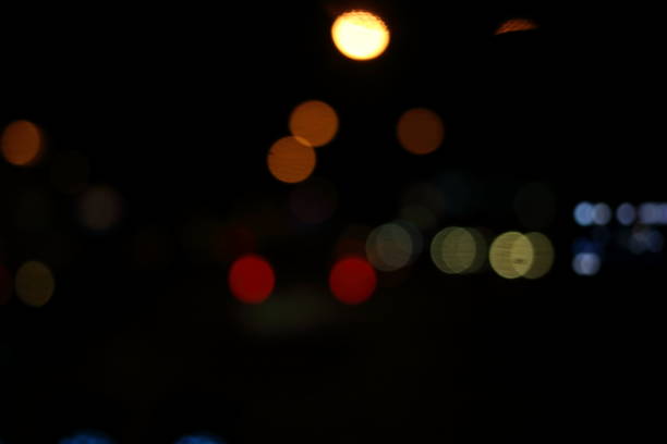 istock Abstract colorful lights bokeh with night background. 845482526