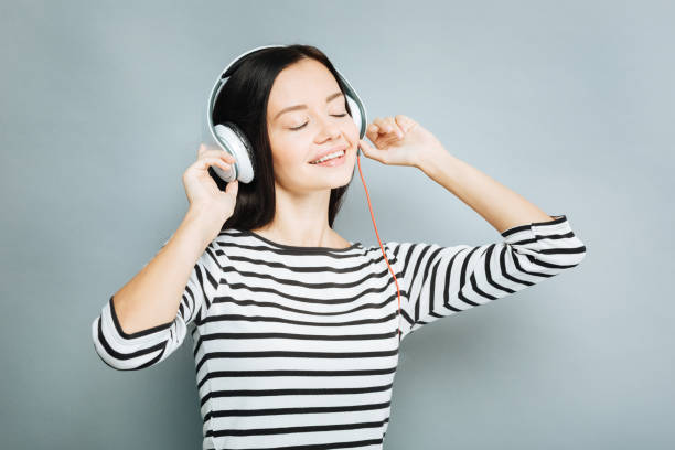 istock Relaxed brunette listening calm music 845486704