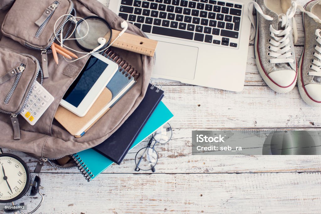 Backpack with school supplies University Stock Photo