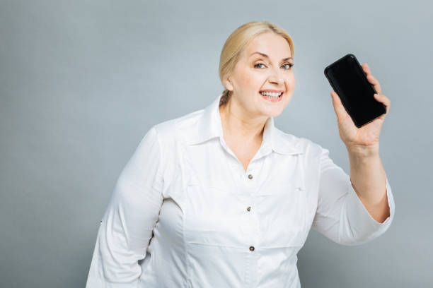 istock Amazing senior blonde looking at camera 845487096