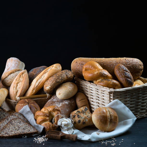 istock Different bread and bread slices, food background. 845493138