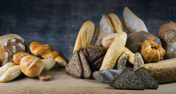 istock Different bread and bread slices, food background. 845493654