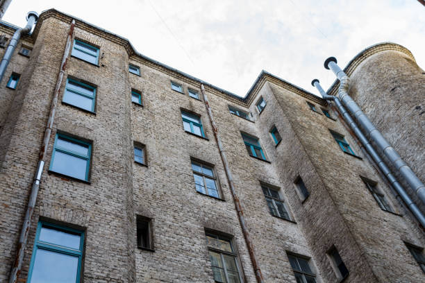 istock An old brick house with windows and gutters in Riga, Latvia 845493942