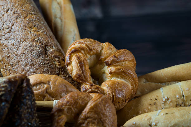 istock Different bread and bread slices, food background. 845494106