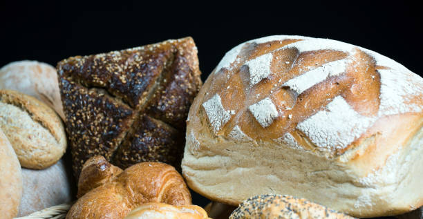 istock Different bread and bread slices, food background. 845494154