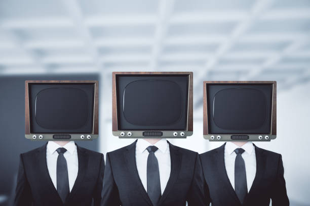 istock Old TV headed businessmen 845494170