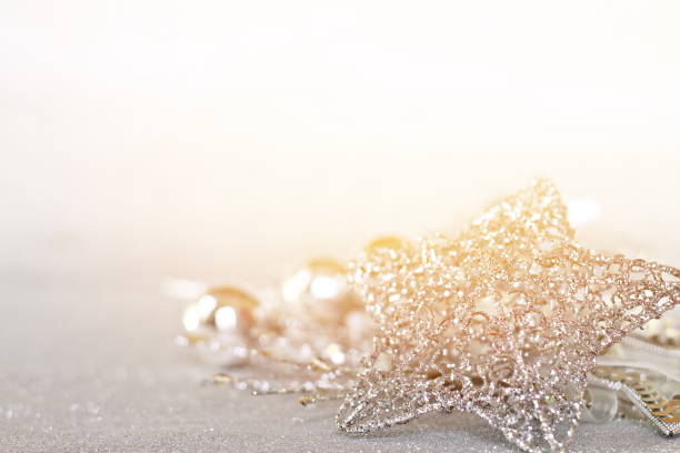 istock Star and shiny silver ornaments on bright abstract background bokeh 845494784