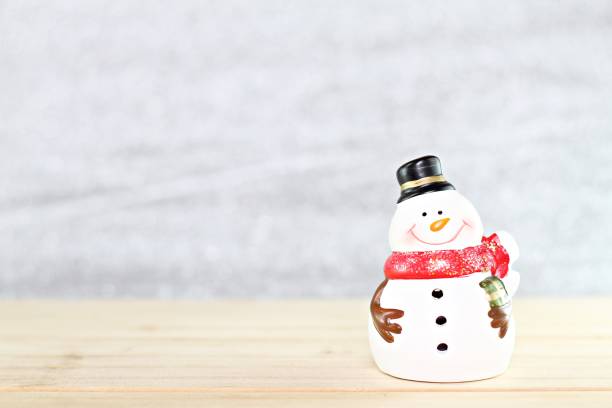 istock Santa Claus doll on wooden table and bright abstract background 845494794