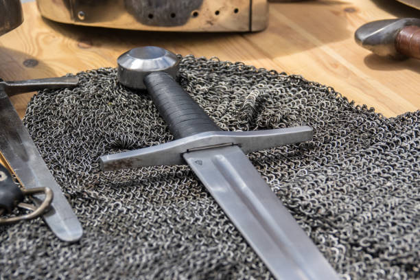 istock Medieval sword and Helmet, chainmail, sword and shields a medieval armor knight 845494816