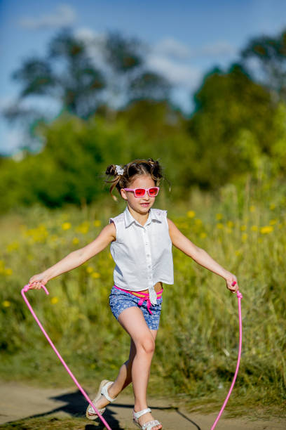 istock girl jumping with a rope 845501008