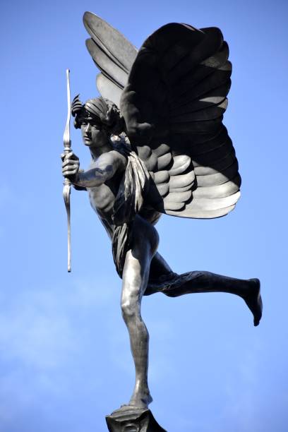 Detail from Eros statue and blue sky in London