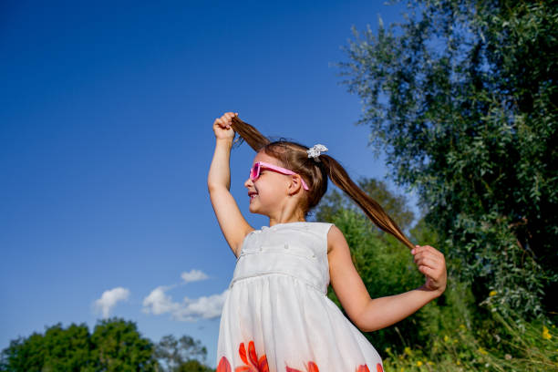 istock cheerful girl walks in the open air 845501122