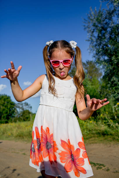 istock cheerful girl walks in the open air 845501146