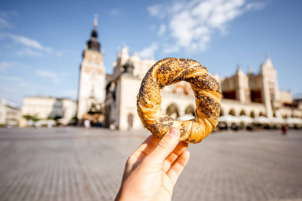 istock Holding prezel in Krakow city 845501266