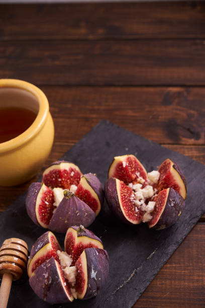 istock Delicious dessert made with figs fruit, cheese and honey 845505786