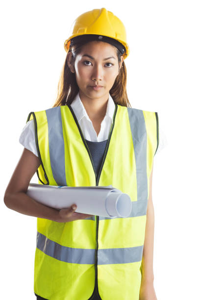 istock Architect woman with yellow helmet and plans 845519956