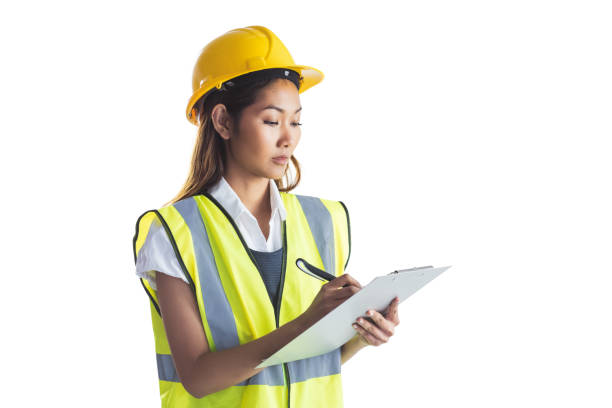 istock Architect woman with yellow helmet and plans 845520004