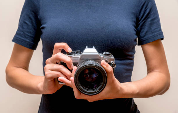 istock Woman Holding A Vintage Camera 845523048