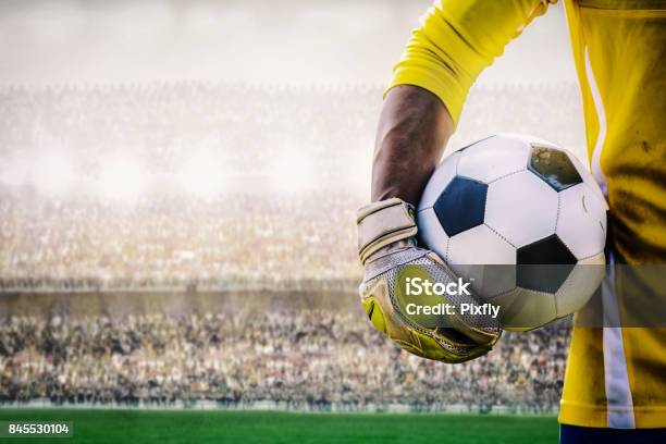 Goalkeeper With A Soccer Ball In The Stadium Stock Photo - Download Image Now - Goalie, Soccer, Soccer Player