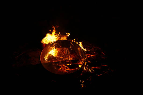 istock Wooden rings burning on a campfire 845530678
