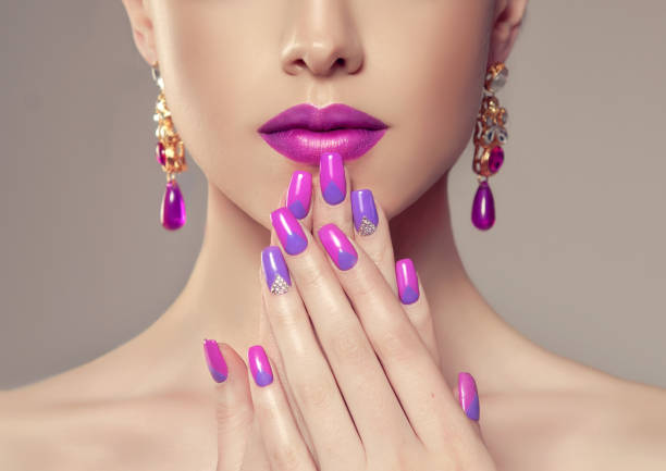 istock Stylish manicure and make up in a purple color. 845534358