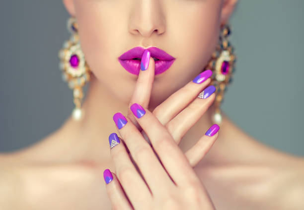 istock Stylish manicure and make up in a purple color. 845534360