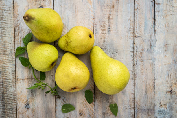 istock Fresh organic pears on old wood. Fruit background. Pear autumn harvest 845537530