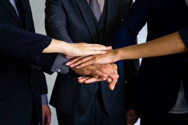 istock Business people joining hands together, success and team work concept. 845537574