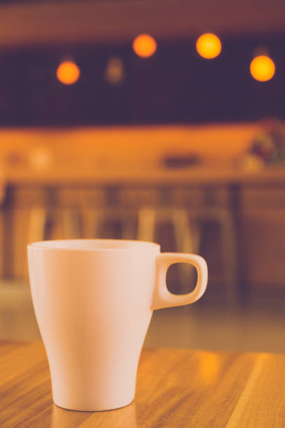 istock Cup of coffee on the table in cafe. Vintage tone 845537622