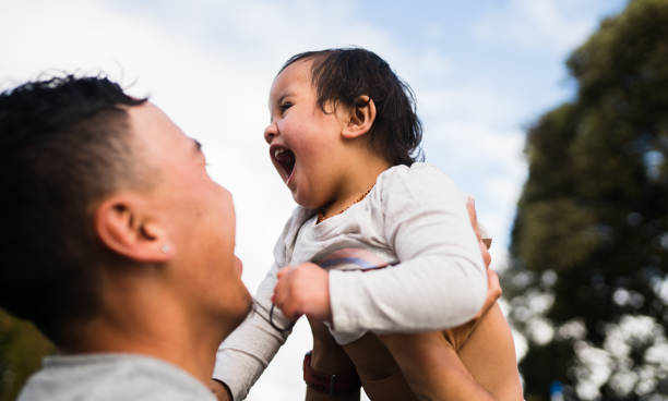 familias de nueva zelanda. - polynesian culture fotografías e imágenes de stock