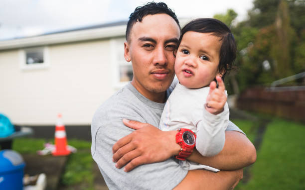 familias de nueva zelanda. - polynesian culture fotografías e imágenes de stock