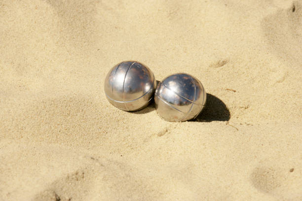 istock Metal balls in the sand 845549420