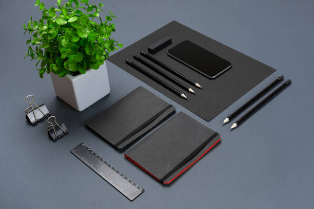 istock Modern mock up flat lay of notebook and stationery on gray background 845552310