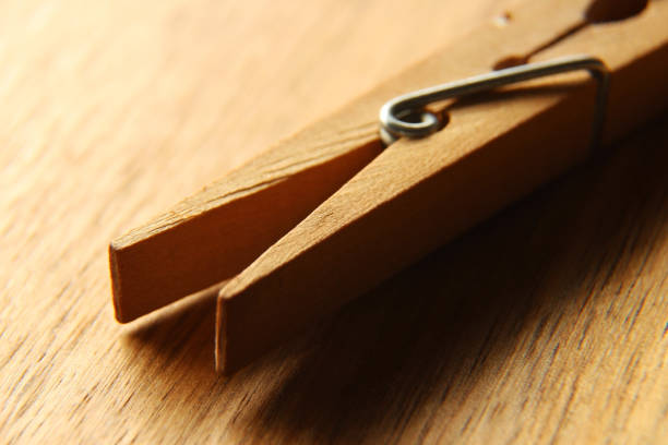 istock A wooden peg on a wooden table. This image can be used to represent laundry. This image has selective focusing. 845558230