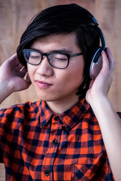 istock Hipster listening music with headphone 845558404