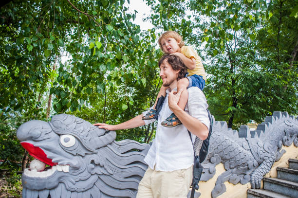istock Happy tourists dad and son in LongSon Pagoda 845559934