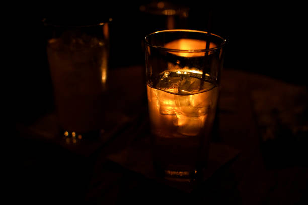 istock cocktail drink on a bar at night 845566262
