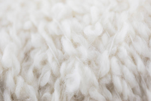 istock Closeup of twisted white wool yarn 845566580